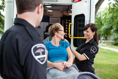 senior citizen woman on an ambulance stretcher